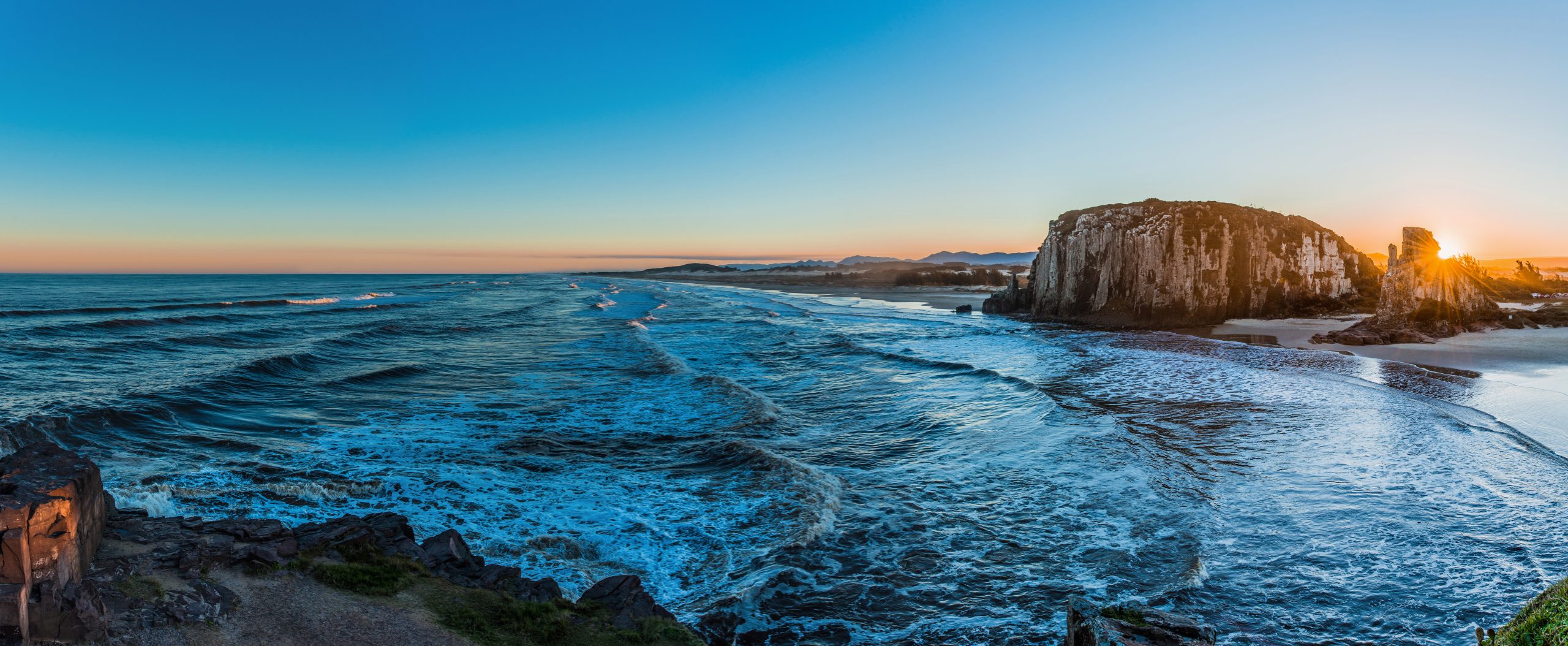 Comportamento do Turista - imagem da praia de Torres no RS